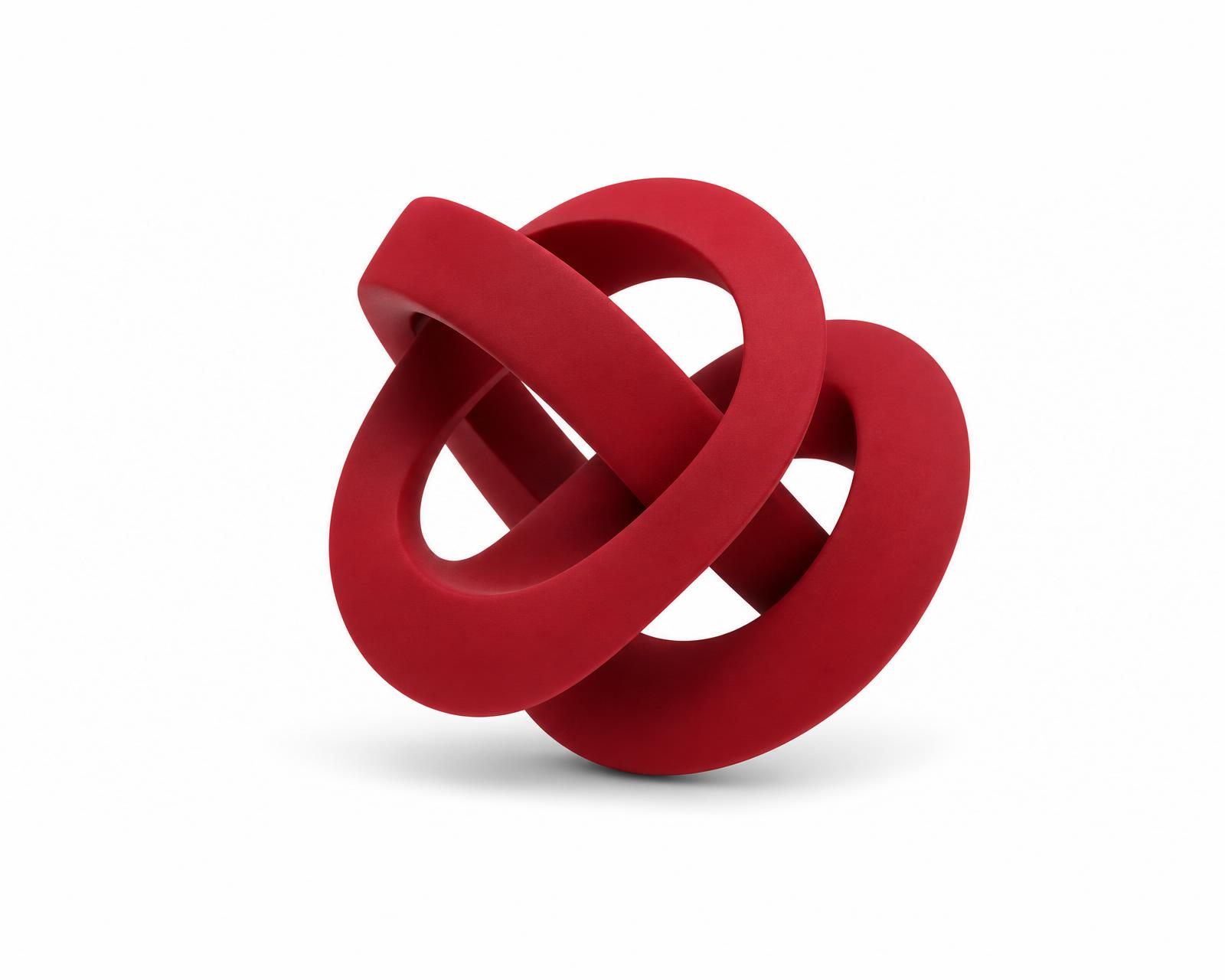 Sculptural matte red knot floating on white
